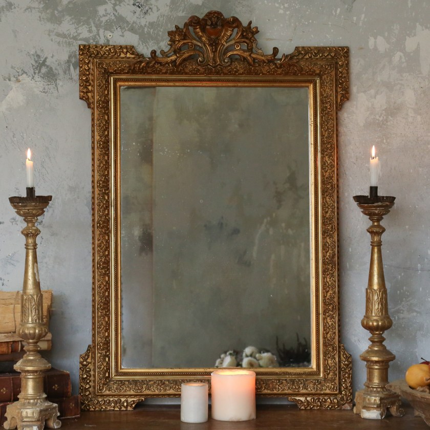 What would this antique mirror say about the beauty of female bodybuilders?